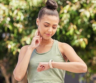 Buy stock photo Woman, watch and fitness for pulse, heart rate or monitoring performance after outdoor workout. Happy female person, runner or athlete checking wristwatch on break or rest from exercise in nature