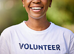 Woman, smile and happy volunteering in park or nature for climate change, earth day or environment. Mouth of person in community service, green NGO or nonprofit tshirt for outdoor support and helping