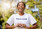 Heart, hands and African volunteer woman with sign for care, support and charity outdoor in nature, forest or environment. Show, love and happy person helping in community or service with empathy