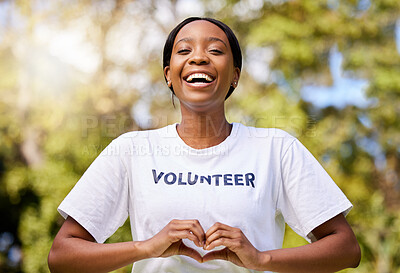 Buy stock photo Heart, hands and African volunteer woman with sign for care, support and charity outdoor in nature, forest or environment. Show, love and happy person helping in community or service with empathy
