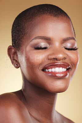 Buy stock photo Beauty, makeup and face of a black woman in studio for self care, skincare and cosmetics. Headshot of african person or aesthetic model with facial shine, dermatology and glow on a beige background