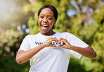 Heart, hands and portrait of volunteer woman with sign for care, support and charity outdoor in nature, forest or environment. Show, love and happy person volunteering in community service in empathy