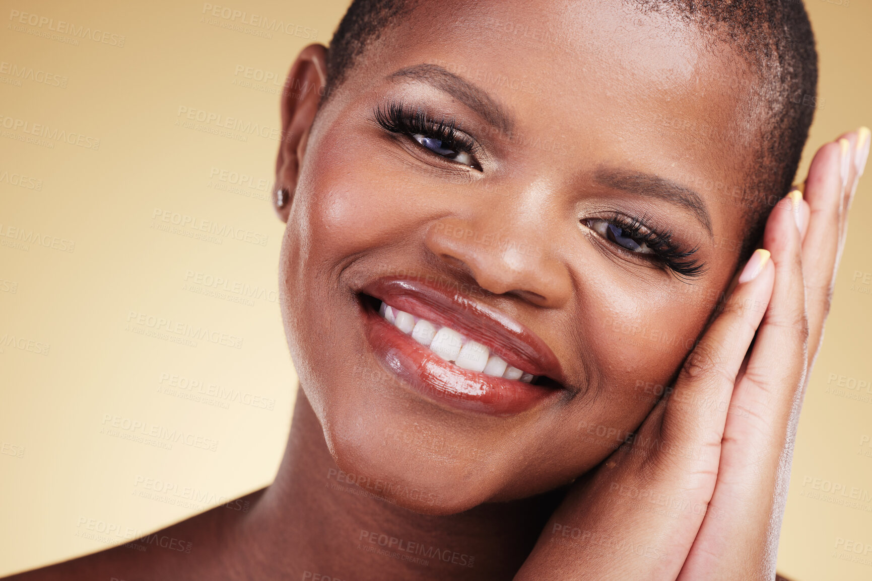 Buy stock photo Makeup, beauty and portrait of a happy woman in studio with hands on face for skin care glow. Closeup of african person or model with facial shine, dermatology and a smile on a beige background
