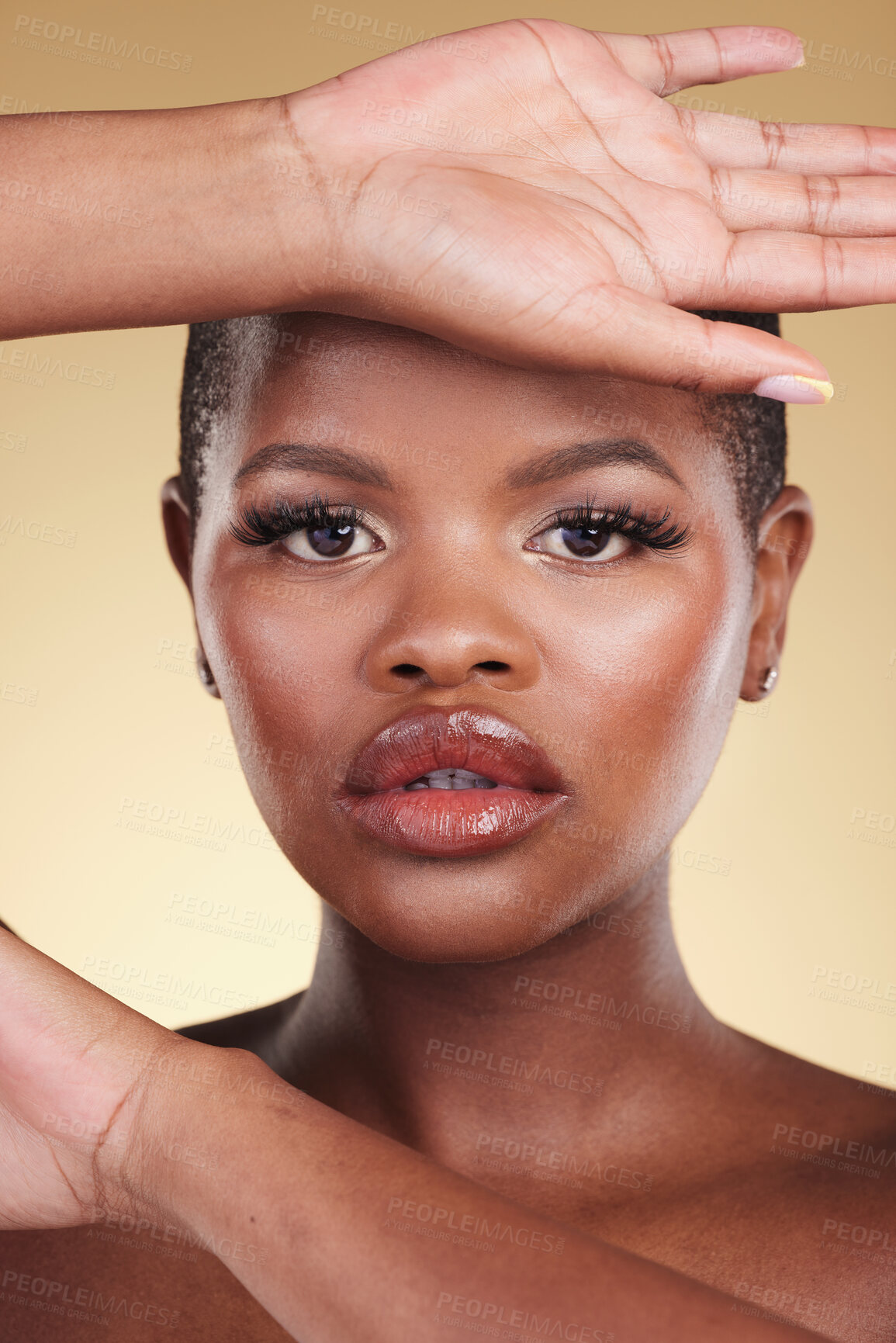 Buy stock photo Beauty, face and a black woman with makeup in studio for skin care, glow and cosmetics. Portrait of african person or aesthetic model with facial shine, dermatology and wellness on a beige background