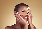 Black woman, hands touching face and beauty with natural cosmetics isolated on studio background. African model, manicure and nail care with smile, makeup and dermatology with skincare and glow