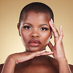 Face, makeup and beauty portrait of a black woman in studio for skin care, glow and cosmetics. Headshot of African model person with facial shine, dermatology and wellness on a beige background