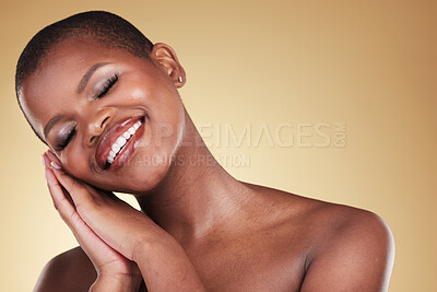 Buy stock photo Face, makeup and beauty of a black woman in studio for skin care, glow and cosmetics. Headshot of happy african person with facial shine, dermatology or wellness on a beige background or mockup space
