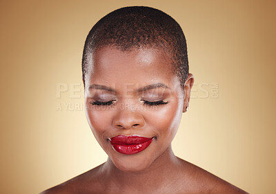 Buy stock photo Face, beauty and a makeup of a black woman in studio for skin care, glow and cosmetics. Headshot of african person or aesthetic model for facial shine, dermatology or red lipstick on beige background
