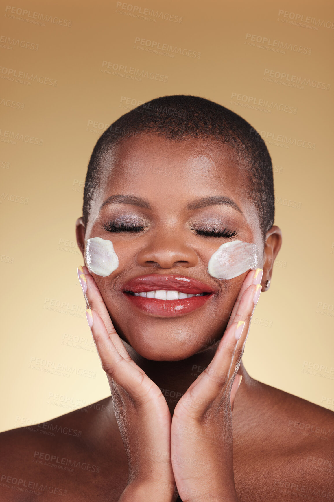 Buy stock photo Skincare, smile and black woman with face cream in studio for makeup removal and wellness on brown background. Facial, cleaning and African model with moisturizer, exfoliate or beauty skin scrub