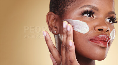 Buy stock photo Skincare, application and face cream for black woman in studio for dermatology or cosmetic results on brown background. Beauty, hand and model with facial, sunscreen or collagen, mask or application
