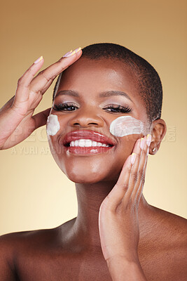 Buy stock photo Skincare, portrait and face cream for black woman in studio happy, dermatology or cosmetic results on brown background. Beauty, smile and model with facial, sunscreen or collagen, mask or application