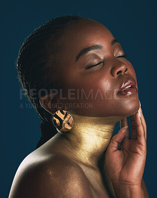 Buy stock photo Beauty, gold and makeup with face of black woman for creative, luxury and cosmetics. Glow, glamour art and design with profile of model on dark background for elegant, skincare and salon treatment