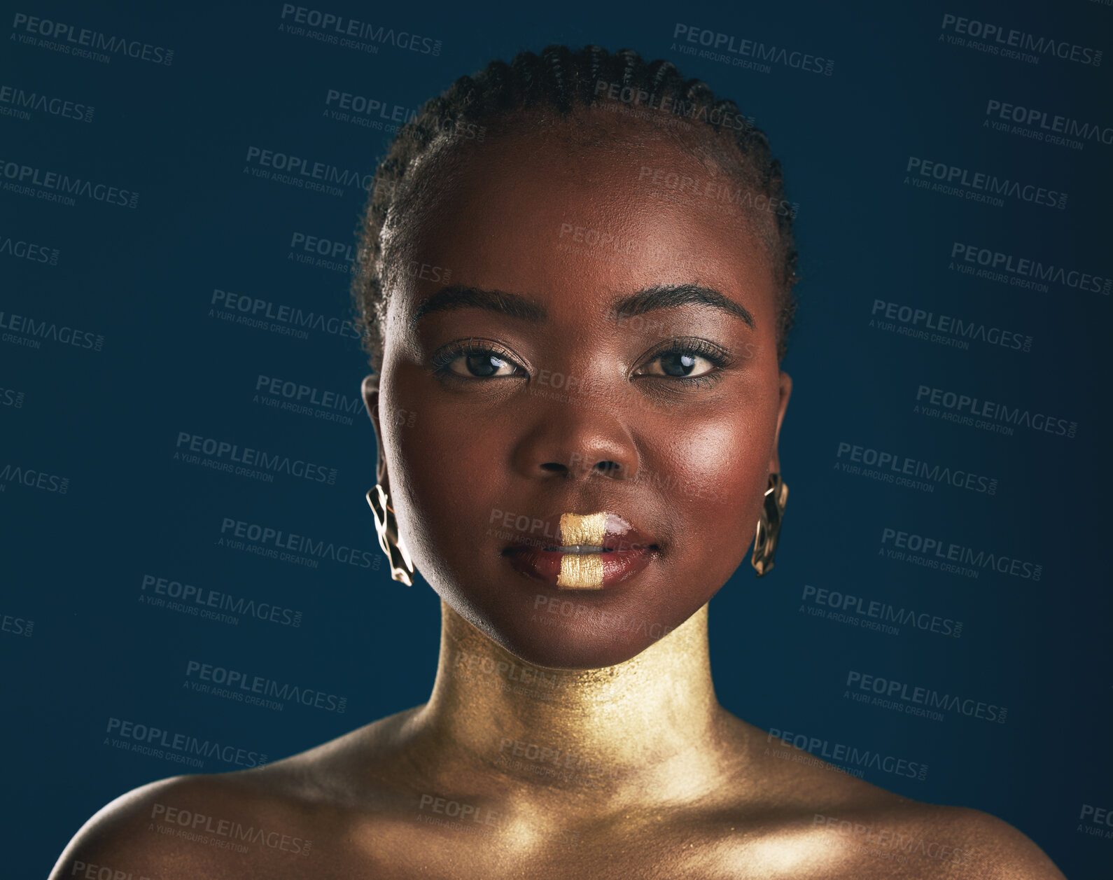 Buy stock photo Gold makeup, studio portrait or black woman with creative art, facial cosmetics paint and lipstick. African culture, face glow and person with beauty design, wellness or creativity on blue background