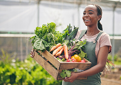 Buy stock photo Woman, farming and vegetables in greenhouse for agriculture, supply chain or business with green product in basket. Happy African farmer or supplier with gardening for NGO, nonprofit or food security