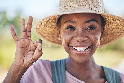 Buy stock photo Smile, okay hand sign and portrait of black woman on farm with sustainable business, nature and sun. Agriculture, happy face and female farmer in Africa, green plants and yes emoji to agro farming