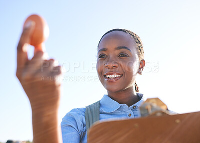 Buy stock photo Woman, quality and egg in hand on farm with clipboard outside for sustainable small business in Africa. Poultry farming inspection, checklist and happy black farmer in countryside with sky and smile.