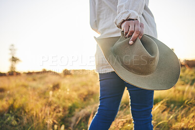 Buy stock photo Farm, agriculture and woman with hat in field on holiday, vacation and travel in countryside. Walk, morning and hands of person with freedom in nature for sustainable farming, growth and environment