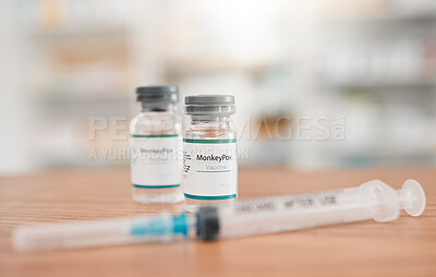 Buy stock photo Pharmacy, syringe and medication for monkeypox vaccine, healthcare or vial in medical cure on table. Drugs, needle and pharmaceutical product on desk for vaccination, flu shot or equipment at clinic