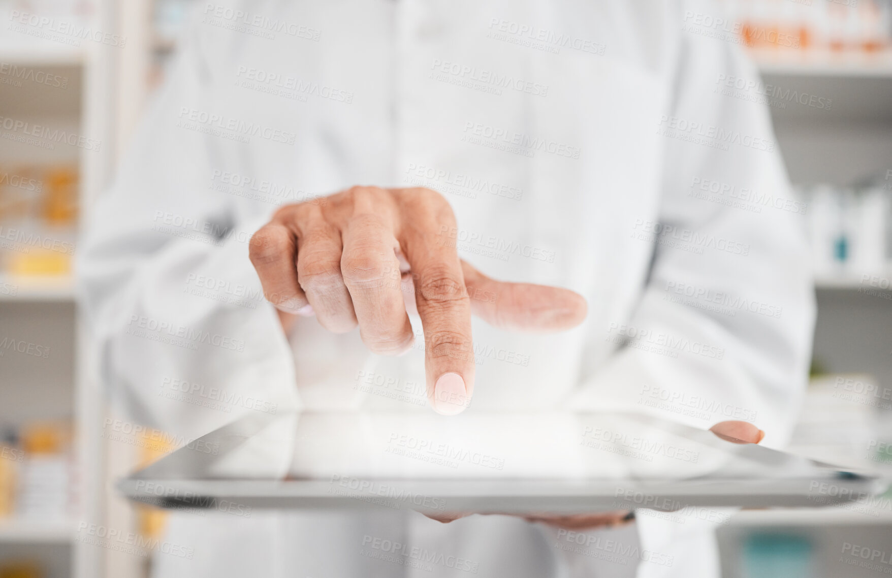 Buy stock photo Person, pharmacist and hands with tablet for inventory inspection, checking stock or research at pharmacy. Closeup of medical or healthcare worker with technology app in pharmaceutical or drugstore