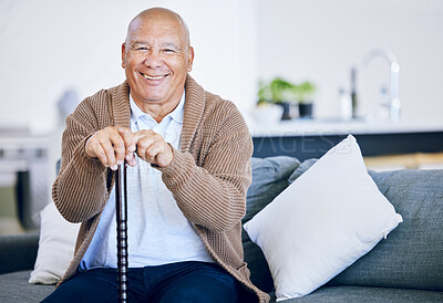 Buy stock photo Portrait, home and old man with a smile,  walking stick and relax with retirement, peace and calm on a couch. Senior person in a living room, elder or pensioner on a sofa, cane or support with health