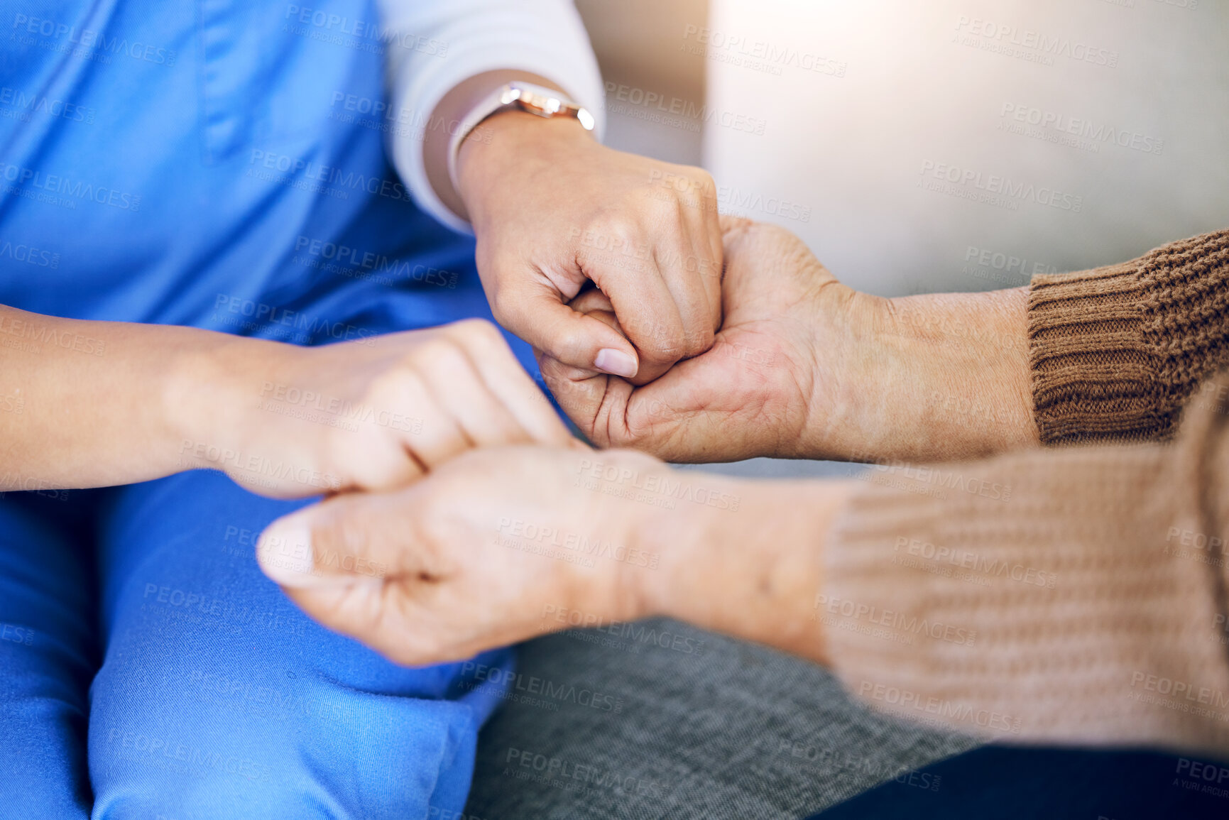 Buy stock photo Closeup, nurse and patient holding hands, help and consultation with healthcare, home and support. Zoom, caregiver or pensioner with sympathy, praying and advice with results, hope and rehabilitation