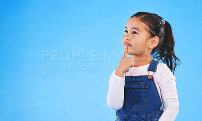 Buy stock photo Thinking, child and girl with ideas, solution and question with doubt on a blue studio background. Mockup space, kid or model with planning, choice and inspiration with problem solving or opportunity