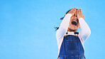 Scared, horror and kid screaming, cover face and studio isolated on a blue background mockup space. Fear, terror and scary girl child in nightmare, anxiety crisis and shouting for problem in danger