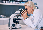 Microscope, research and woman scientist in a lab looking for sample analysis or experiment in laboratory for a medical project. Science, equipment and professional test bacteria or DNA for chemistry