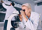 Microscope, research and woman scientist analysis or looking at sample or experiment in a laboratory for a medical project. Science, equipment and professional test bacteria or DNA in a chemistry lab