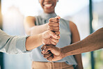 Fist bump, support or business people for motivation or teamwork for mission or collaboration. Partnership, hands closeup or employees meeting in huddle with goal, vision or group solidarity together