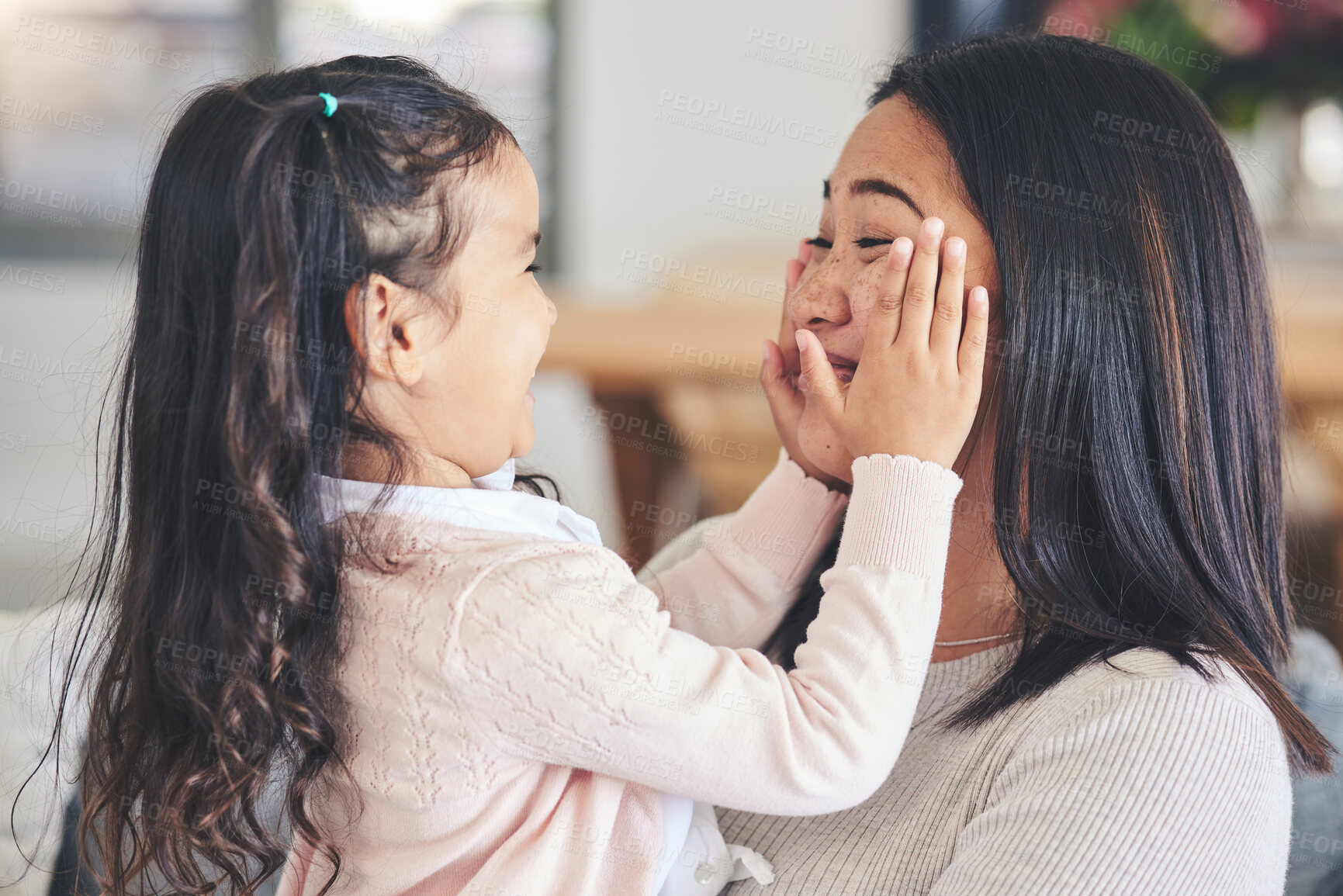 Buy stock photo Smile, happy and playful with mother and daughter on sofa for love, care and support. Funny, calm and relax with woman and young girl embrace in living room of family home for peace, cute and bonding