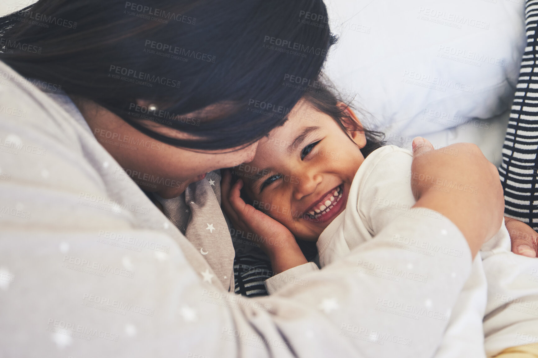 Buy stock photo Bed, mother and daughter hug at home with love, care and happiness in morning. Portrait of a woman and girl child together in a bedroom for fun time, playing and security or relax in a family house