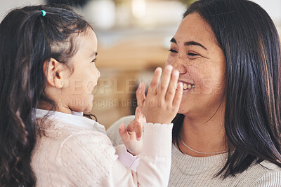 Buy stock photo Love, happy and playful with mother and daughter on sofa for smile, care and support. Funny, calm and relax with woman and young girl embrace in living room of family home for peace, cute and bonding