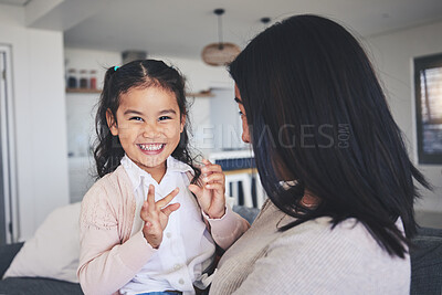 Buy stock photo Love, smile and portrait of mother and daughter on sofa for playful, care or support. Happy, calm and relax with woman and young girl embrace in living room of family home for peace, cute and bonding