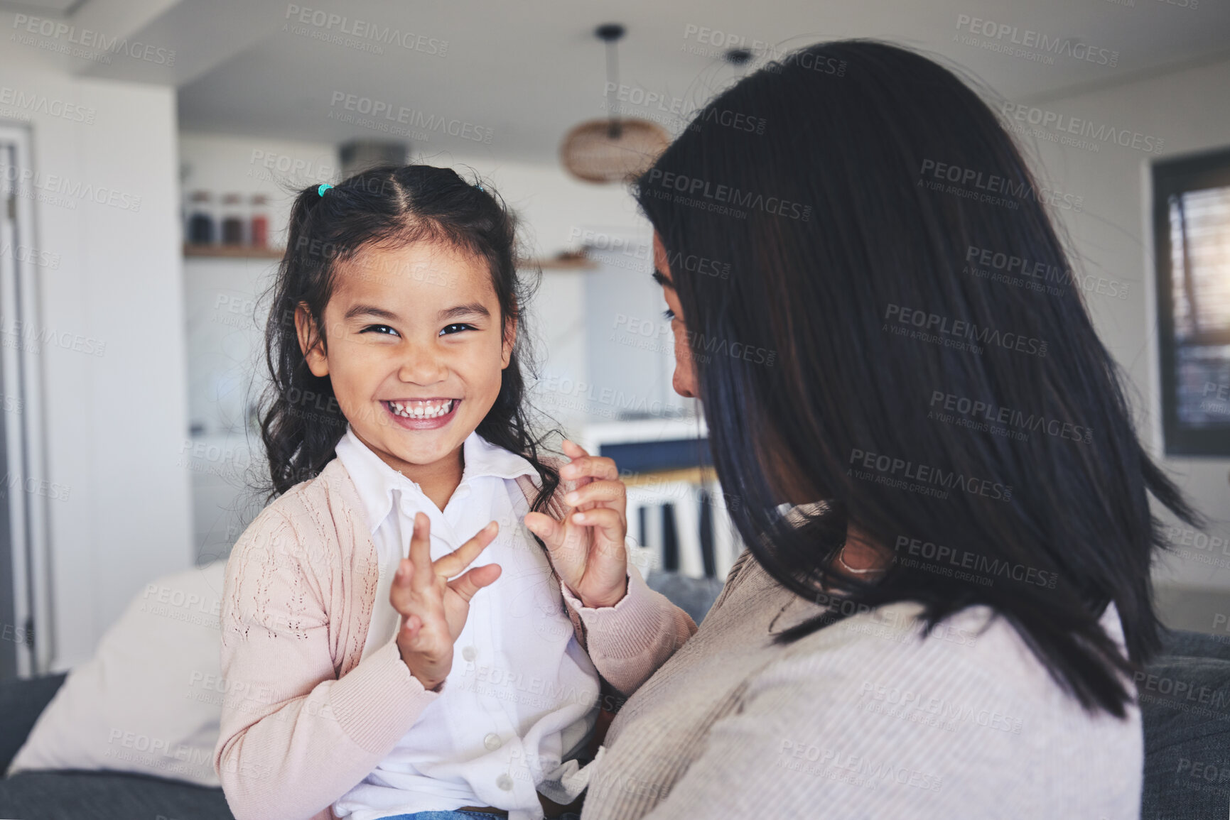 Buy stock photo Love, smile and portrait of mother and daughter on sofa for playful, care or support. Happy, calm and relax with woman and young girl embrace in living room of family home for peace, cute and bonding