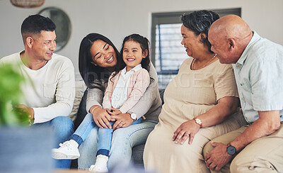 Buy stock photo Happy, care and a big family on the sofa with a child during a visit for love, bonding and playing. Smile, laughing and a girl kid with parents and grandparents on the home couch to relax and talk