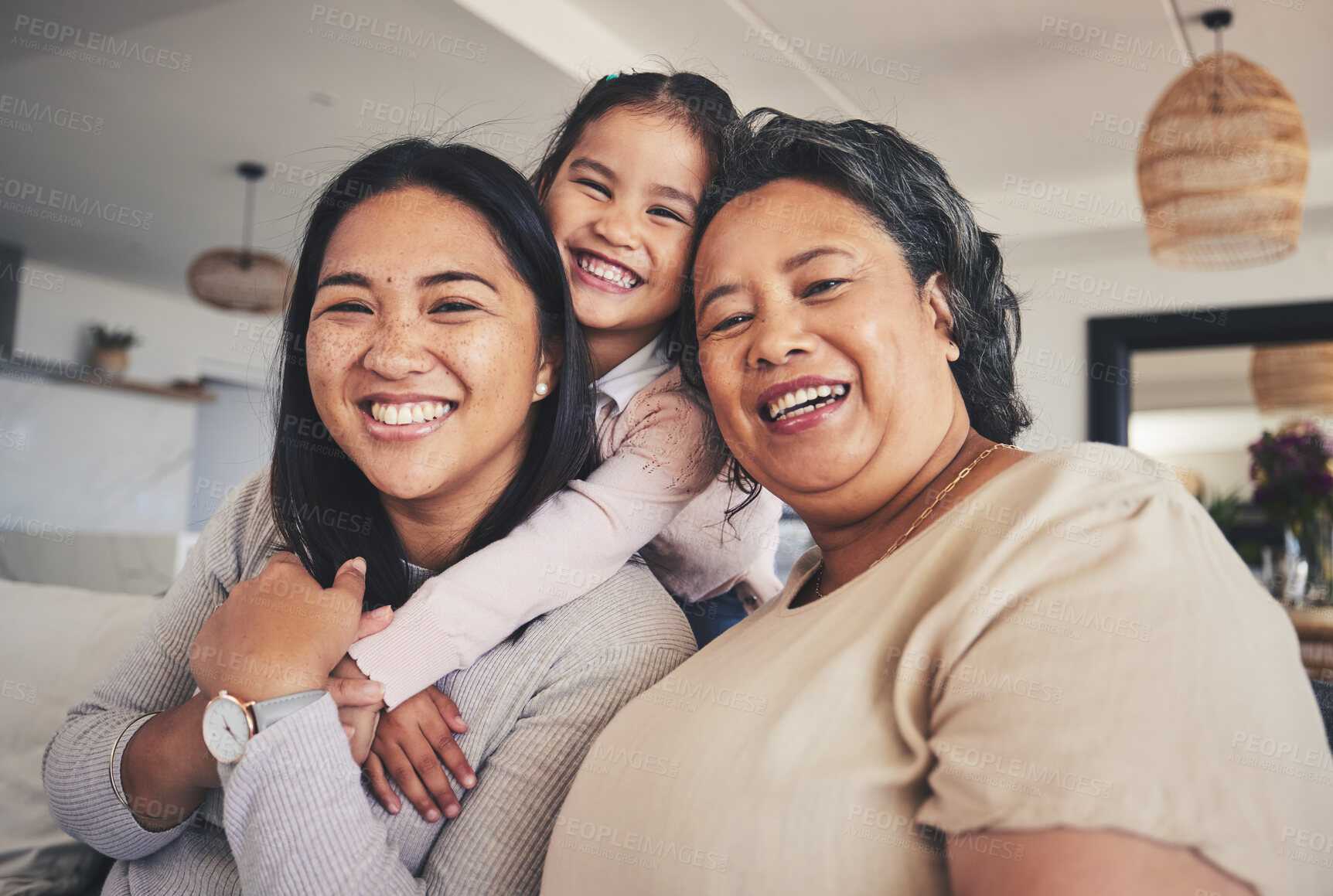 Buy stock photo Hug, women and generations with portrait of family on sofa for smile, bonding and support. Happy, relax and grandparent with mother and child in living room at home for calm, care and peace together