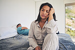 Frustrated couple, argument and fight in conflict on bed after disagreement, cheating or affair. Upset or unhappy woman and man in divorce, depression or toxic relationship and breakup in the bedroom