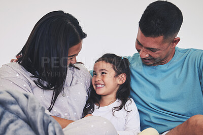 Buy stock photo Love, family and child in bed at home with care, support and happiness in morning. A woman, man and girl kid laugh together in a bedroom for fun time, playing and security or relax in a house