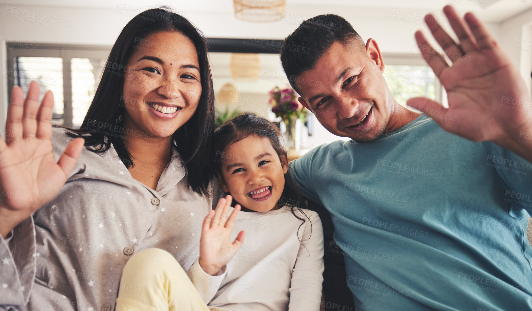 Buy stock photo Parents, girl and wave in video call, portrait and smile for hello, contact and relax in family home. Asian father, mother and daughter with hand, sign language and greeting for respect in Jakarta