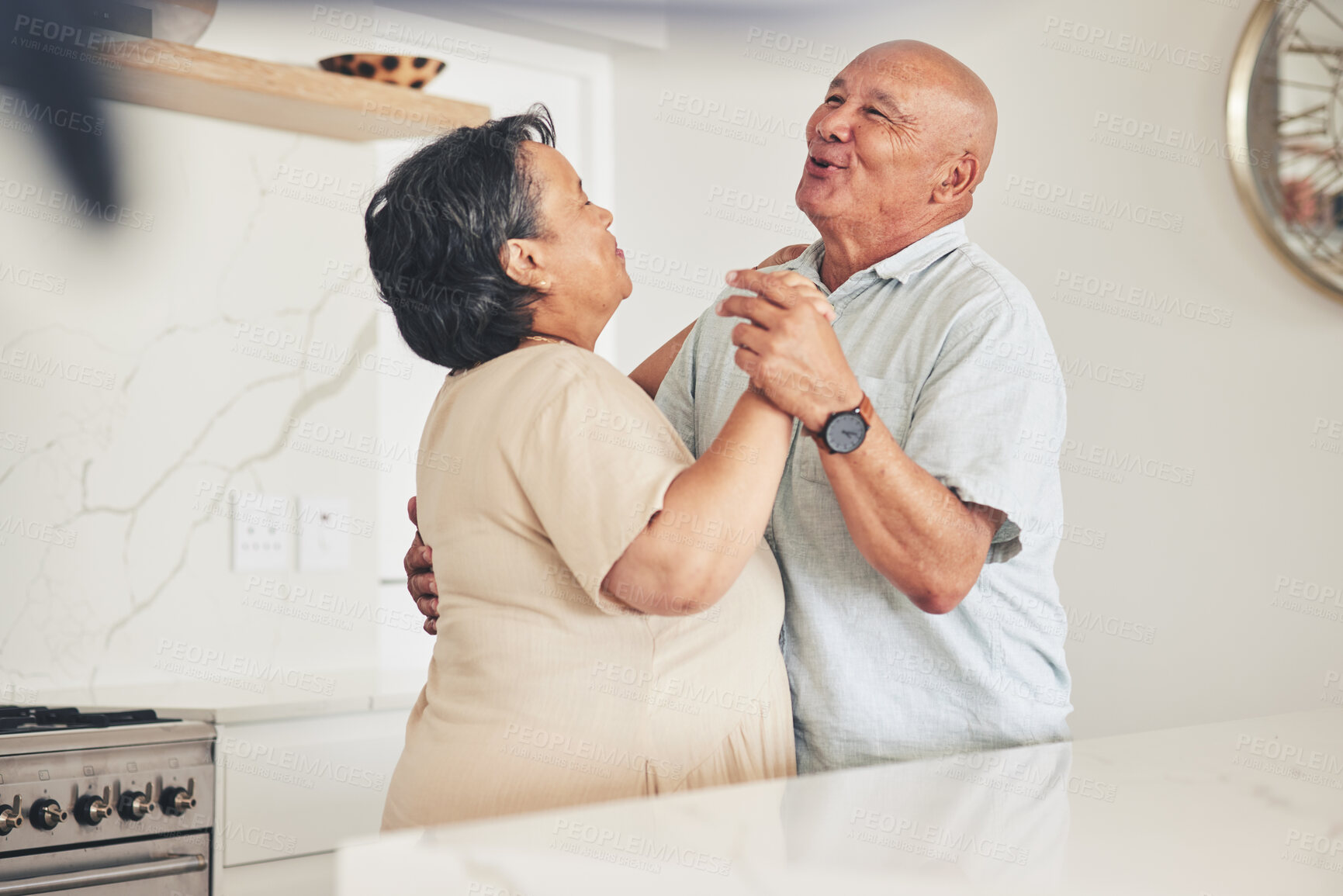 Buy stock photo Happy, holding hands or old couple dancing in home kitchen for love, care or support while bonding together. Smile, elderly man or senior woman in celebration for anniversary or romance in retirement