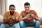 Men on sofa with video games, excited fun and relax in home living room together on internet with controller. Online gaming, esports and happy gamer friends play on couch on virtual app in apartment.