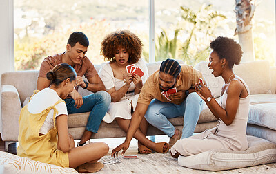 Buy stock photo Game, relax or friends playing cards, poker or black jack at home for gambling together in a holiday party. Diversity, men or group of happy women laughing in living room in a fun match competition