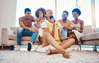 Buy stock photo Microphone, relax or friends singing in home living room together in a party on holiday vacation break. Girl singer, happy men or group of funny women laughing in a fun karaoke competition or game