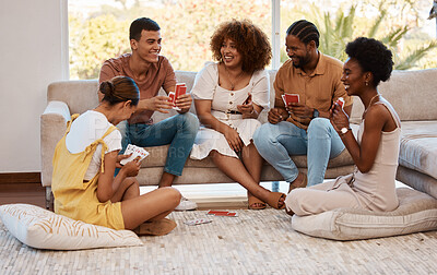 Buy stock photo Game, happy people or friends playing cards, poker or black jack at home for gambling together in a party. Smile, men or group of women laughing to relax in living room in a fun match on holiday