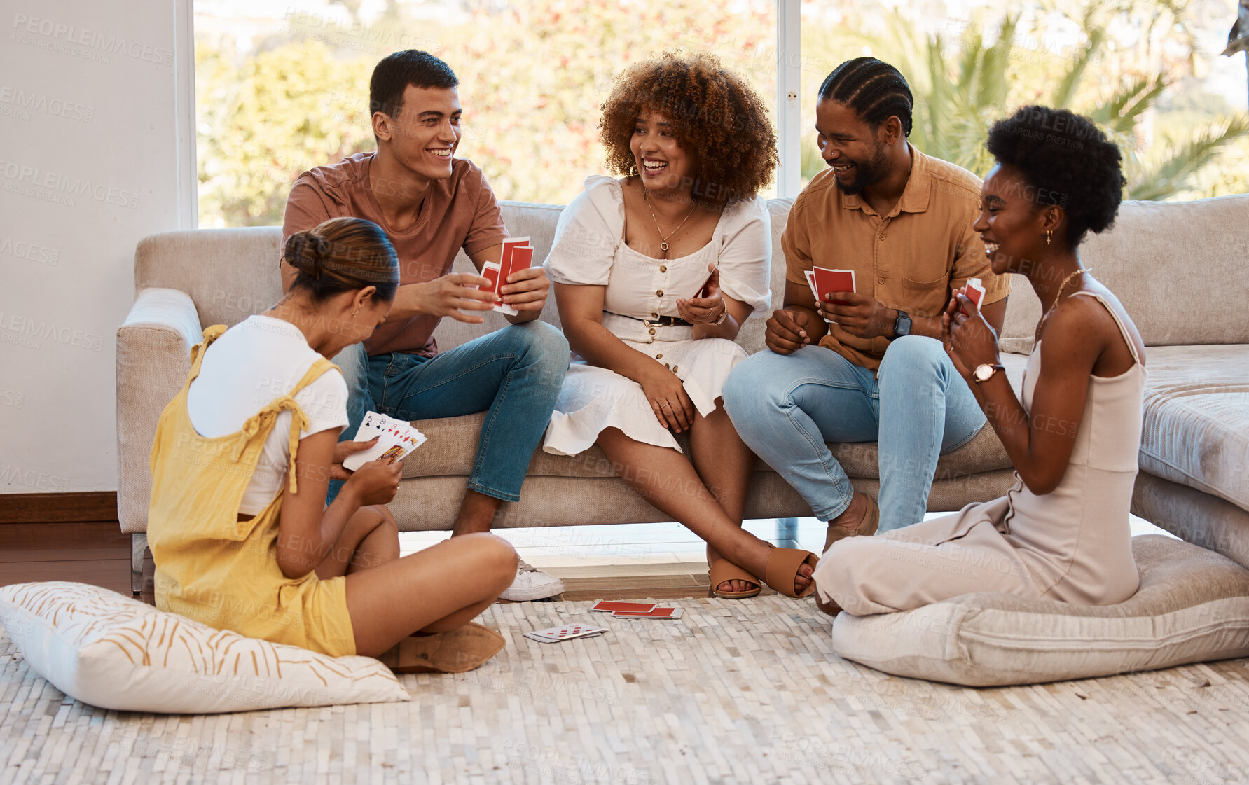 Buy stock photo Game, happy people or friends playing cards, poker or black jack at home for gambling together in a party. Smile, men or group of women laughing to relax in living room in a fun match on holiday