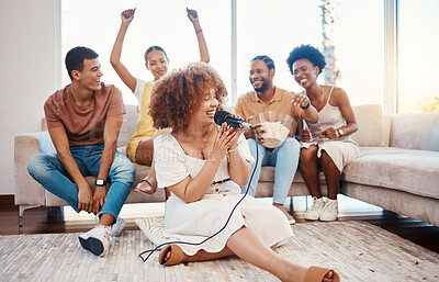 Buy stock photo Microphone, happy people or woman singing in home living room together in party on holiday vacation break. Girl singer, men or group of funny women laughing in a fun karaoke game with popcorn snacks