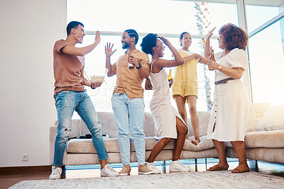 Buy stock photo Friends, excited and beer to celebrate at a house with happiness, fun and a high five in a lounge. Diversity, alcohol and party with men and women together for drinks, gathering or reunion at home