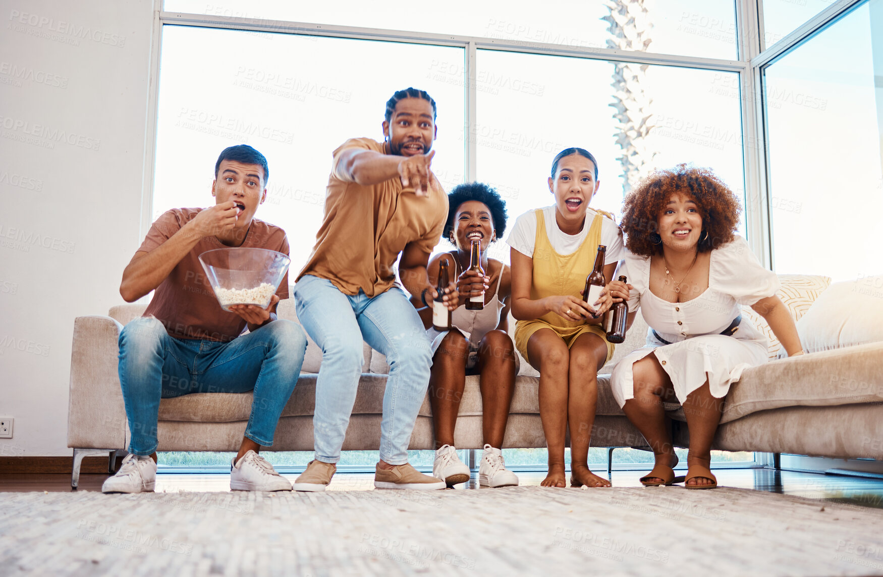 Buy stock photo Beer, popcorn and friends watching tv, surprise and bonding in home living room together. Wow, happy people and group on television to drink alcohol, streaming movie or film, eating food and relax