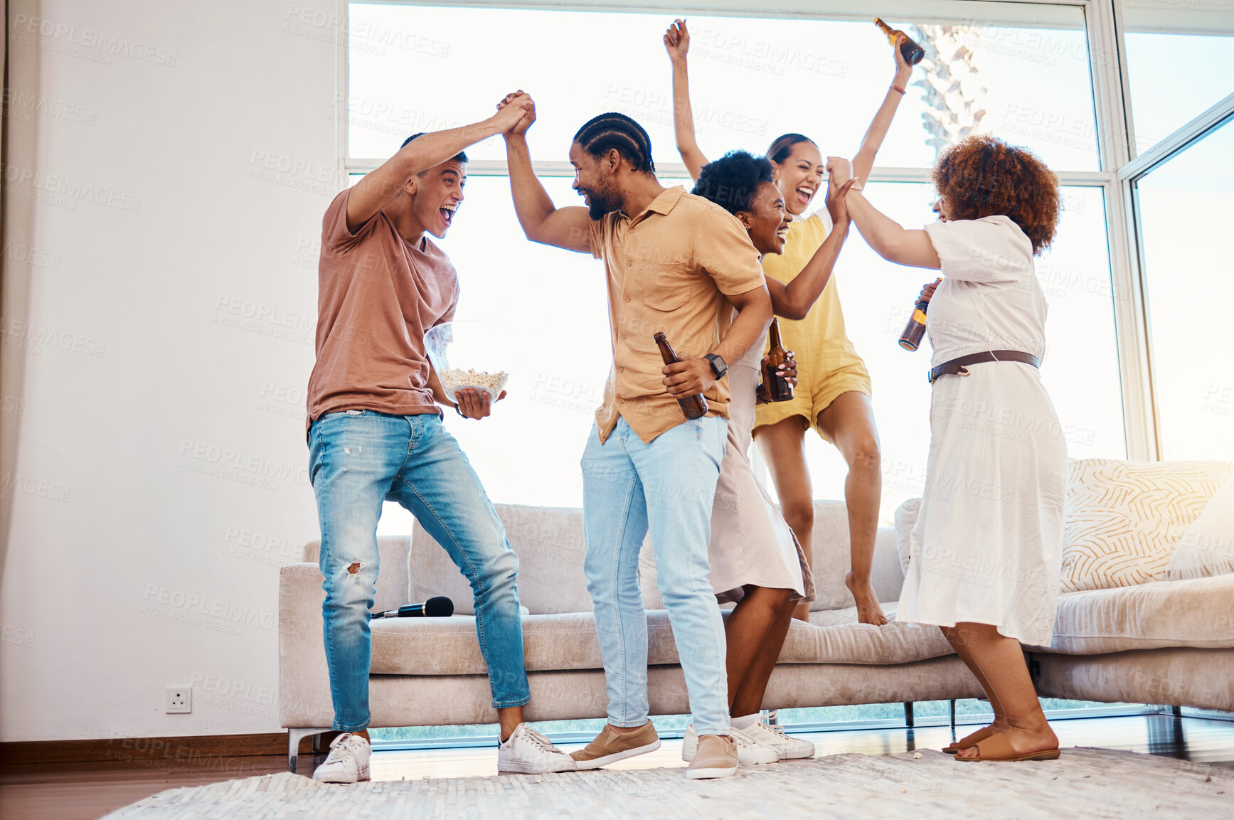 Buy stock photo Beer, excited and friends celebrate at a house with happiness, fun and energy in a lounge. Diversity, alcohol and party with men and women together for drinks, social gathering or reunion at home